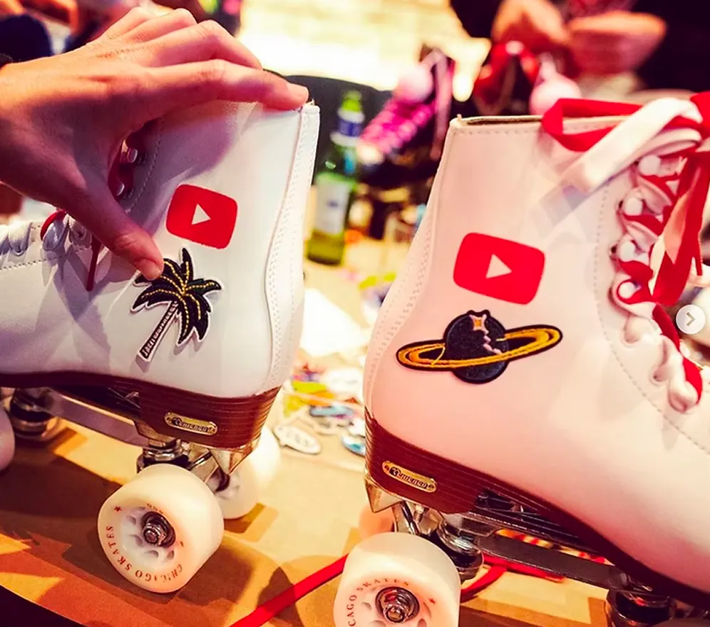 Roller skates with YouTube logo design