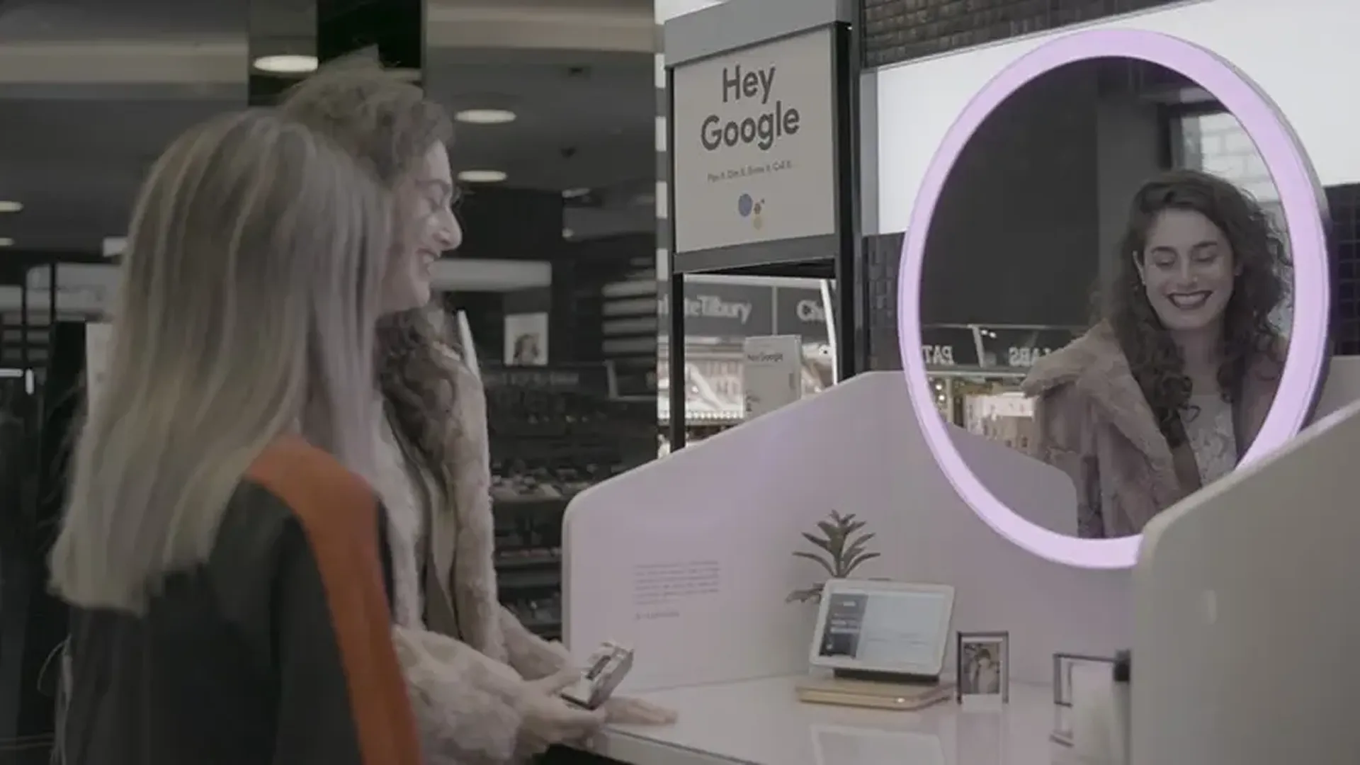 Attendees interact with a Google Home-inspired vanity installation, exploring smart-home technology within a familiar bedroom setting. The experience blends personal routines with connected technology, creating an approachable and engaging moment that demonstrates how voice assistance can integrate seamlessly into everyday life.